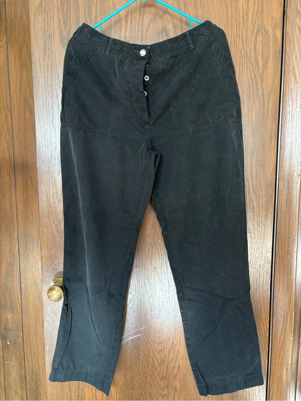 Fitigues black pants feature a utility design inspired by vintage military pants